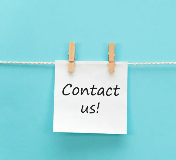 A Contact us note pinned to a line, inviting a free estimate