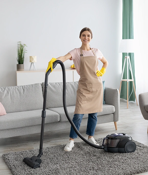 A positive Choice Cleaning Plus cleaner ready to clean a student housing common area